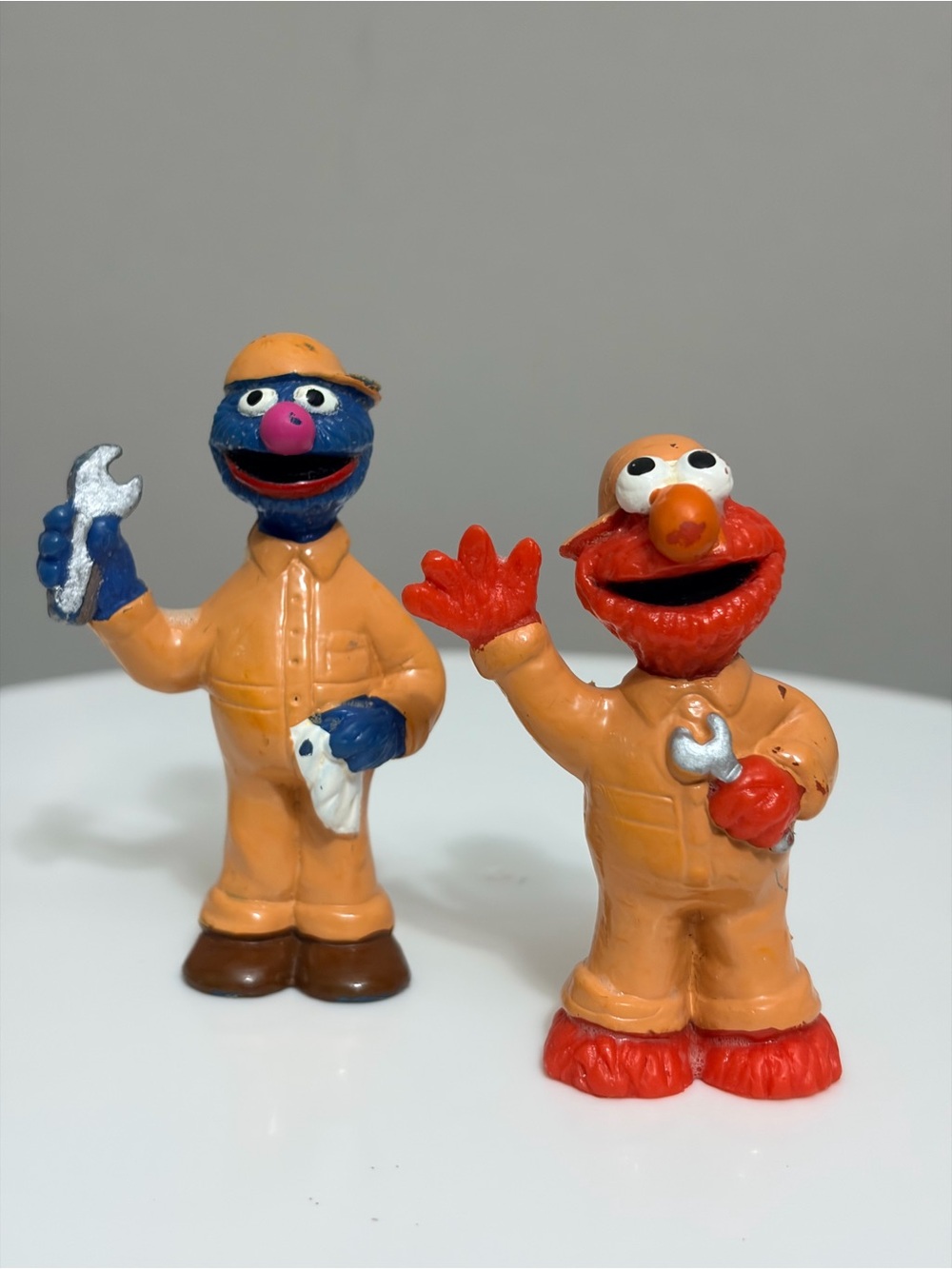 VTG 1990 Sesame Street Mechanic Grover/Elmo in orange jumpsuits with Wrenches